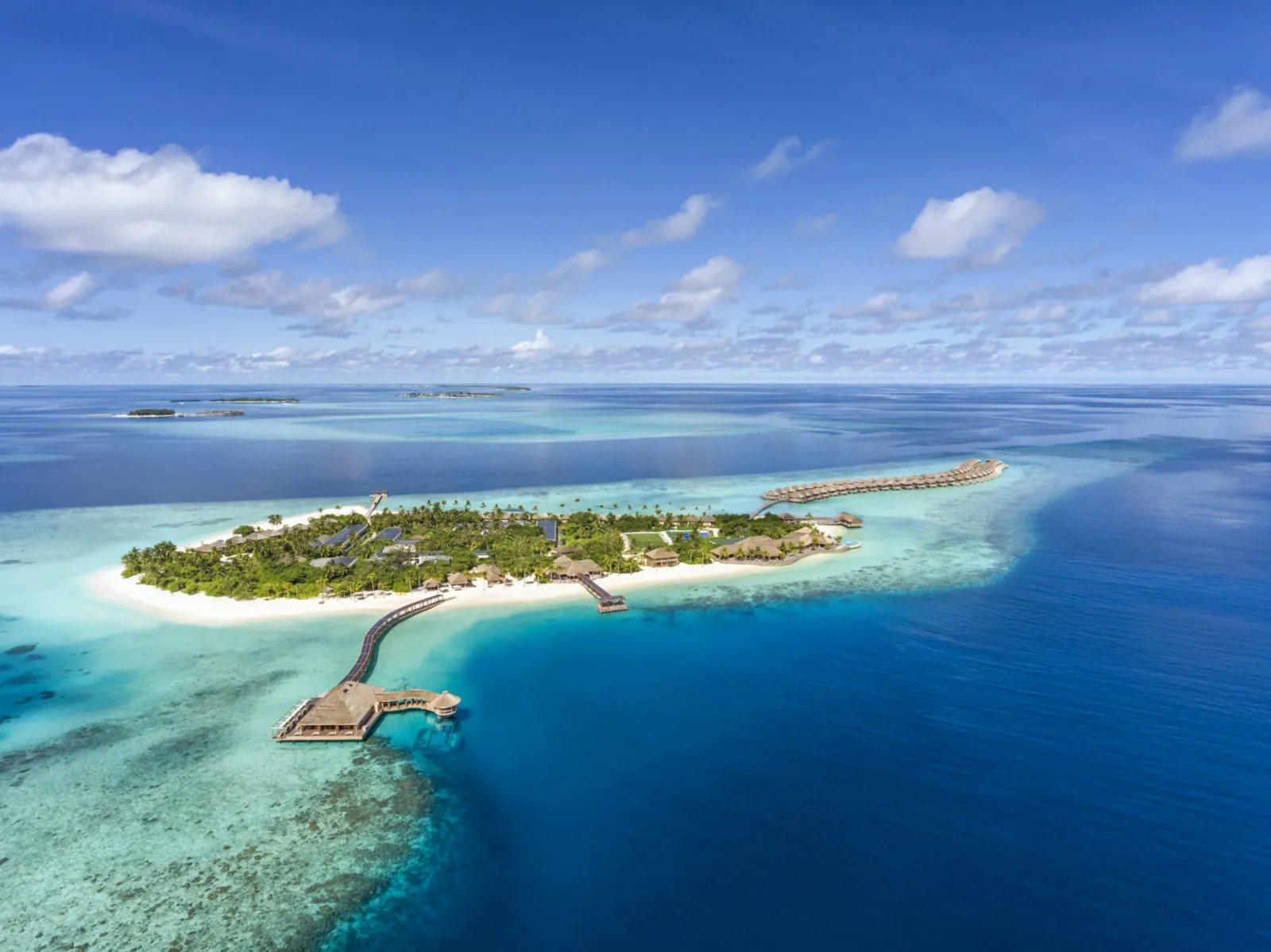 Aerial view of Hurawalhi island and overwater villas, Maldives
