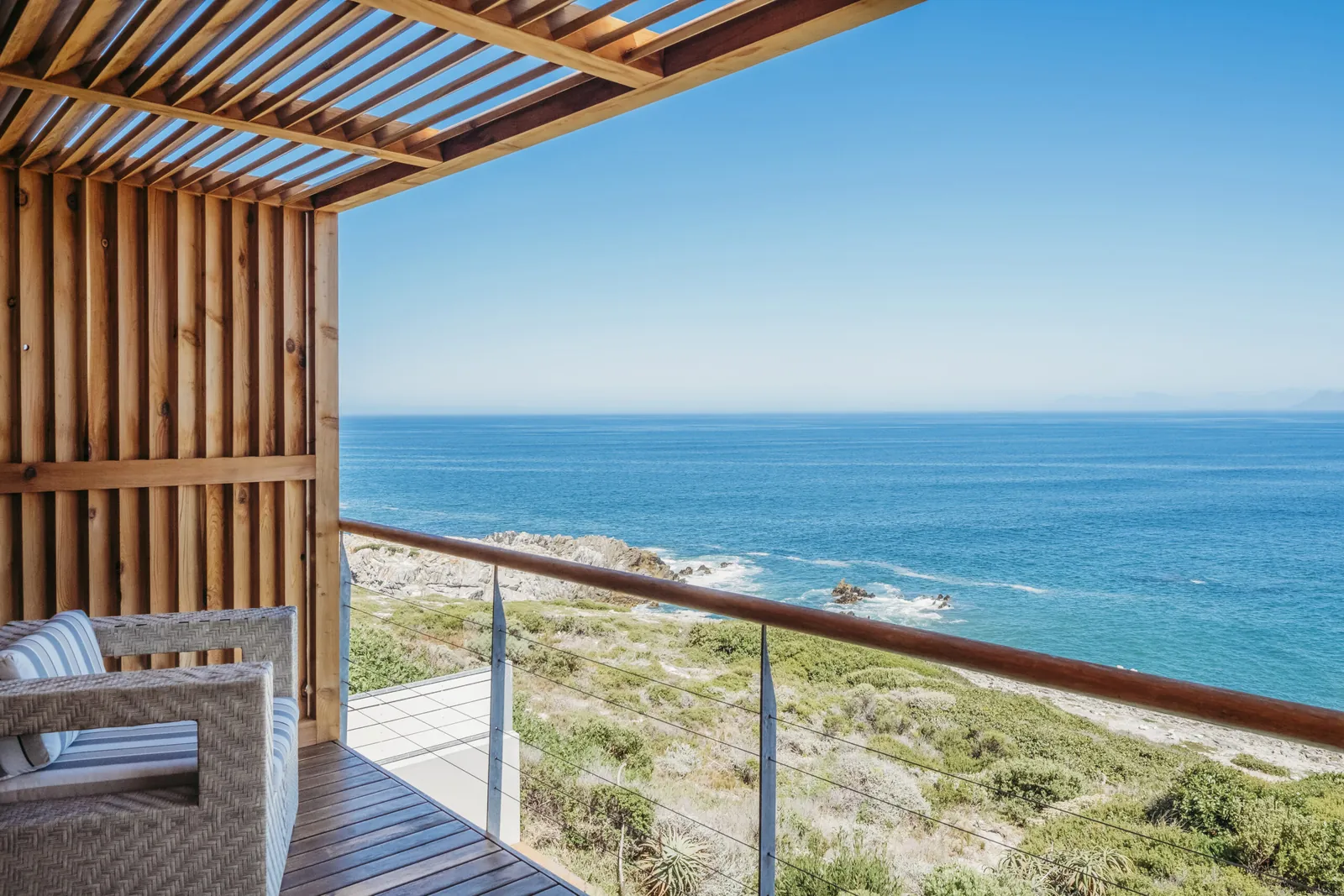 The North Room deck overlooking Walker Bay at Cliff Lodge, De Kelders.