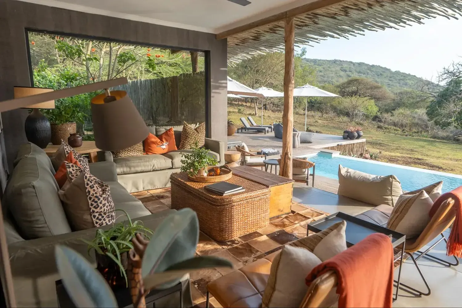 Sungulwane open-air lounge overlooking the pool and bush